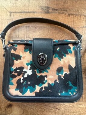 Coach black leather with tan, teal, and white calf hair